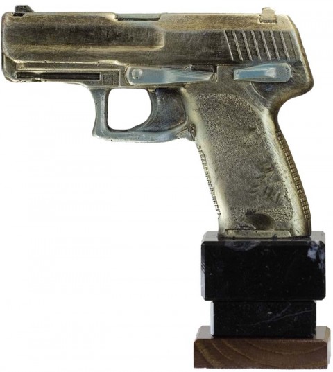 trofeo resina pistola 15 cm.